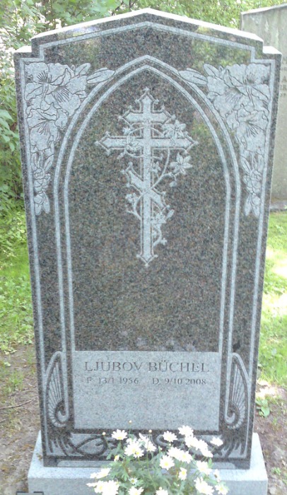 Specialgjord gravsten med motiv av ett kors